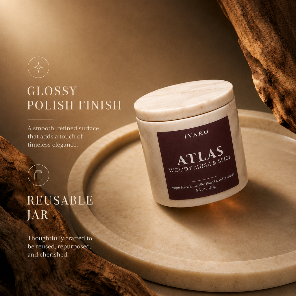 Lit IVARO ATLAS marble candle with soothing wooden wick and warm woody fragrance for timeless spaces